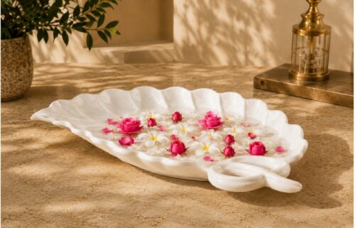 Elegant marble leaf decorative bowl with floating flowers for luxury home decoration