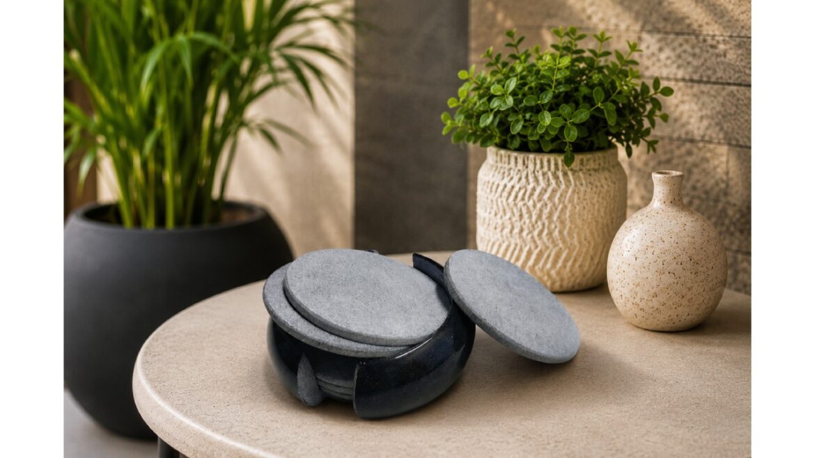 Elegant handcrafted marble coaster set displayed on a modern table with decorative indoor plants, perfect for luxury home décor and tabletop styling.